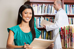 AmeriTech College student at computer